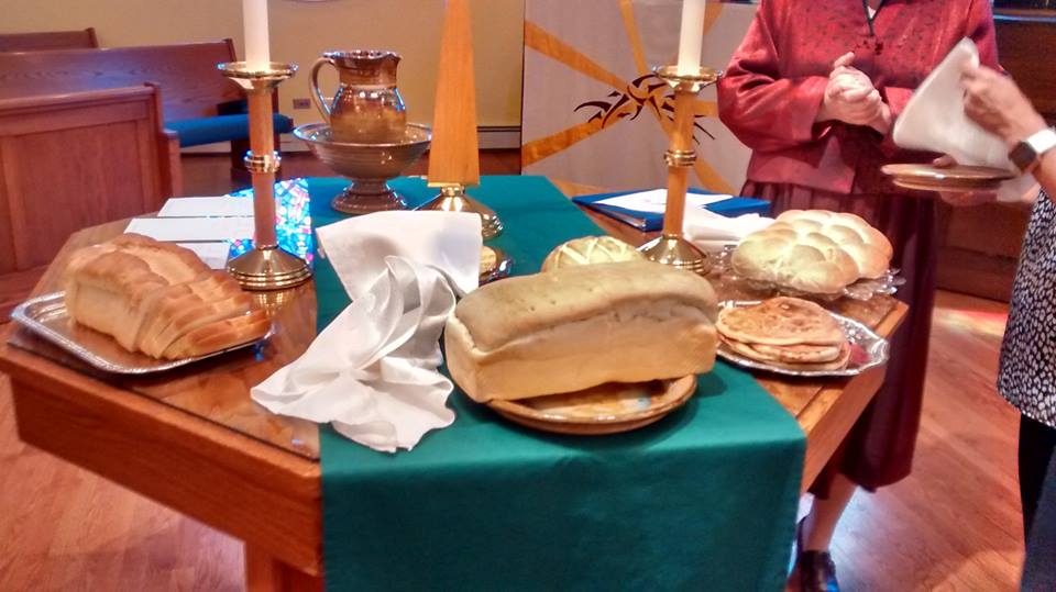Congregants share bread from their cultures for World Communion Sunday